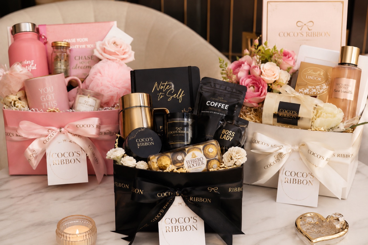 Trio of pink, black and ivory gift baskets
