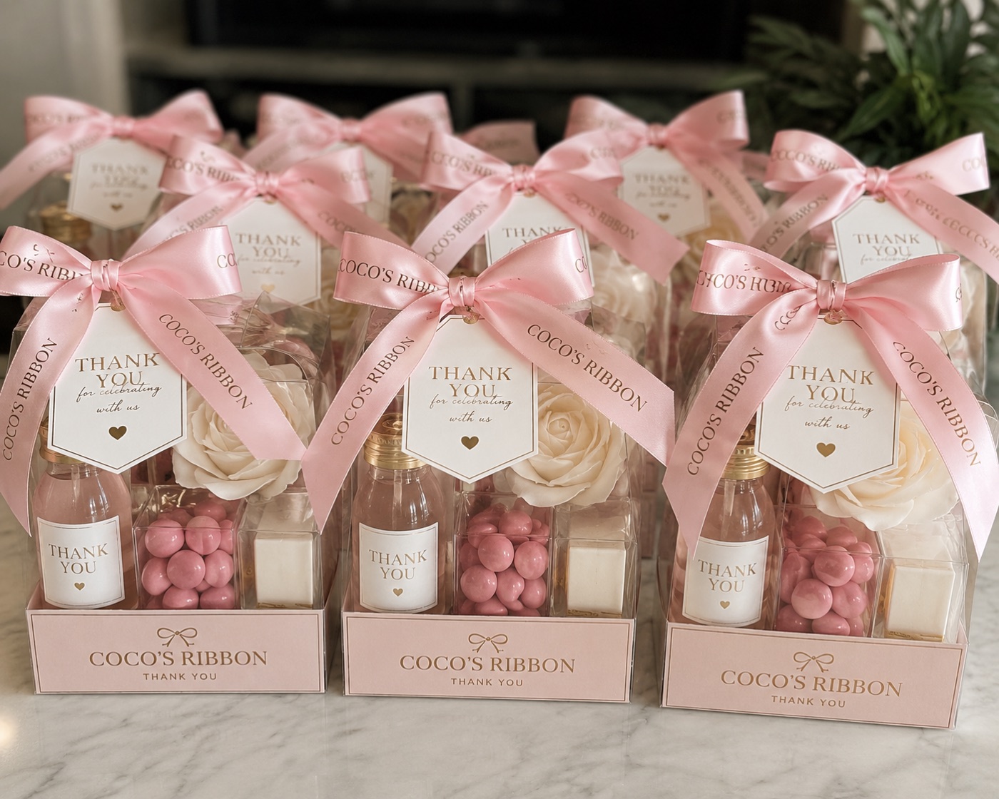 Blush pink thank-you party favors